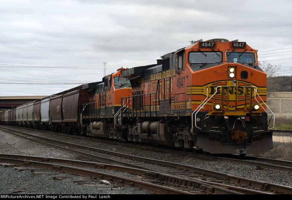 Grain train rolls east